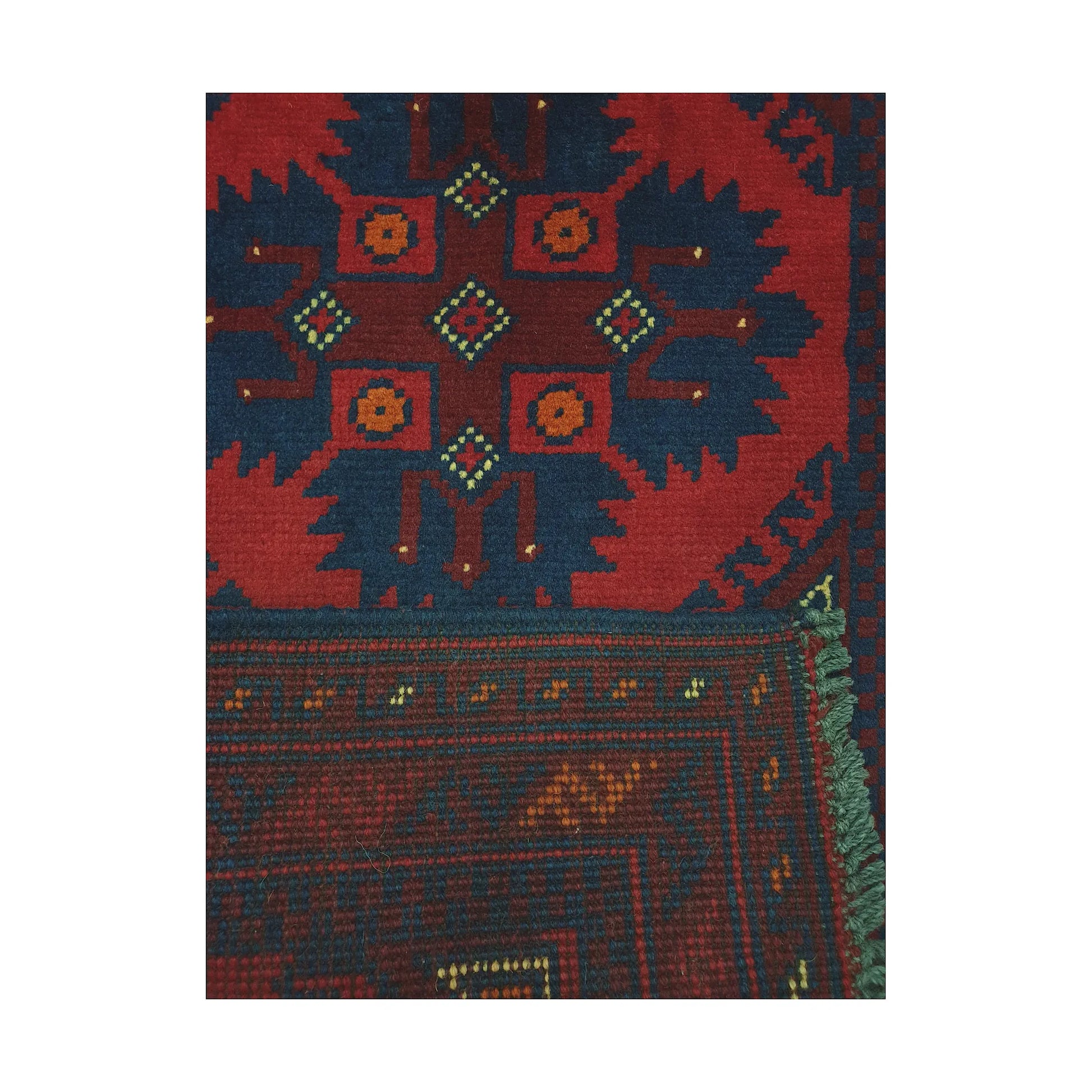 Folded corner reverse-weave detail of Afghan Khal Mohammadi hand-knotted wool rug showing back structure, border pattern, fringe and weave