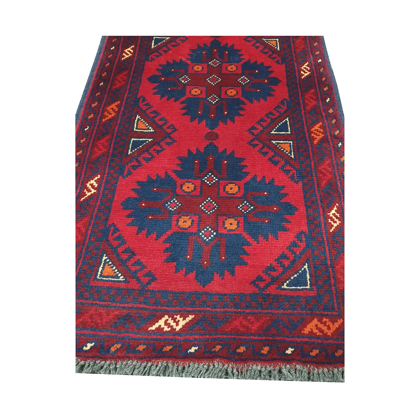 Geometric medallion and field detail of Afghan Khal Mohammadi hand-knotted rug showing dark blue motifs on a deep red ground