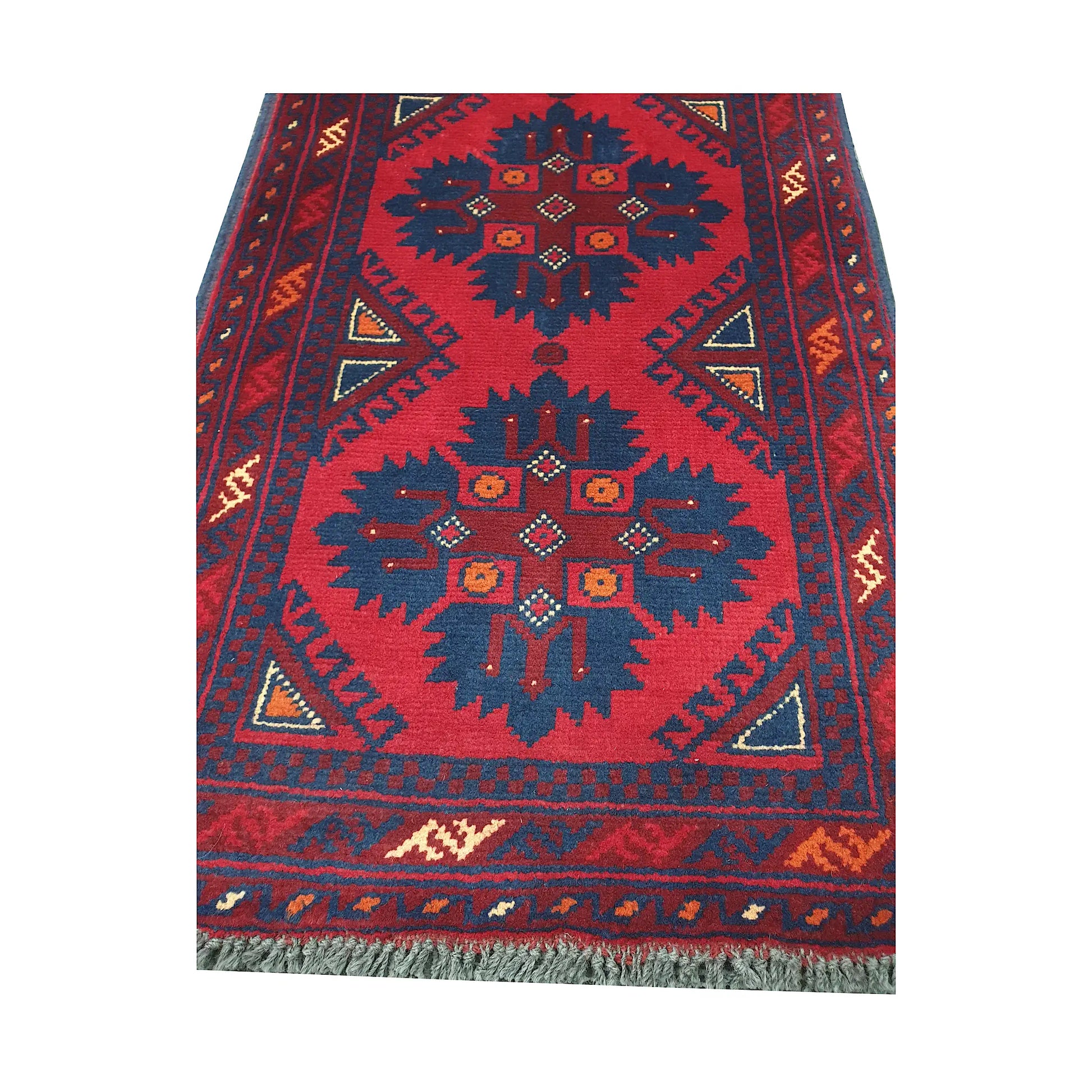 Geometric medallion and field detail of Afghan Khal Mohammadi hand-knotted rug showing dark blue motifs on a deep red ground
