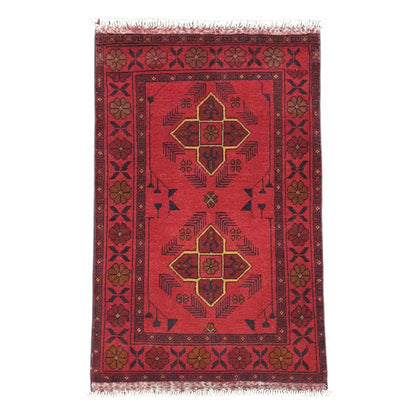 Full view of Afghan Khal Mohammadi hand-knotted wool rug with deep red field, paired geometric medallions and patterned navy border, 125 x 74 cm
