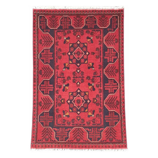Full view of Afghan Khal Mohammadi hand-knotted wool rug with deep red field, geometric medallion and framed border, 127 x 78 cm