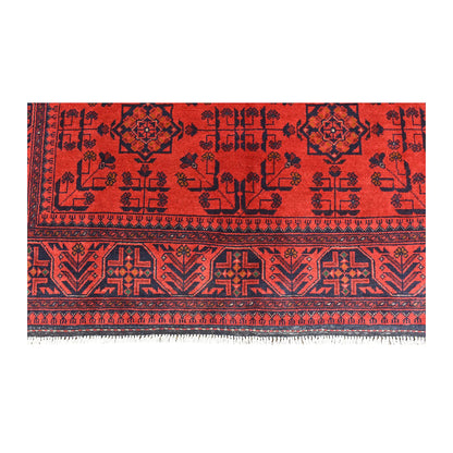 Fringe and end-border detail of Khal Mohammadi rug with red geometric-floral motifs and dark navy angular bands
