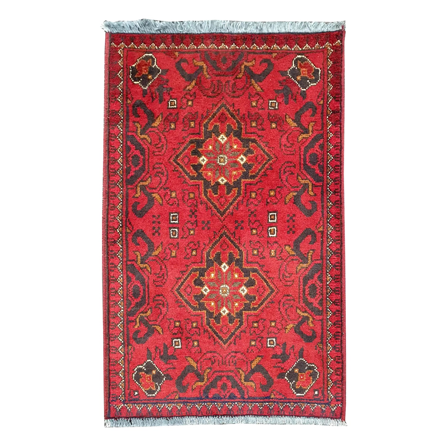 Full view of Afghan Khal Mohammadi hand-knotted wool rug with deep red field, central geometric medallion and patterned border, 97 x 52 cm