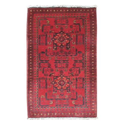 Full view of Afghan Khal Mohammadi hand-knotted wool rug with deep red field, dark geometric motifs and patterned border, 97 x 54 cm
