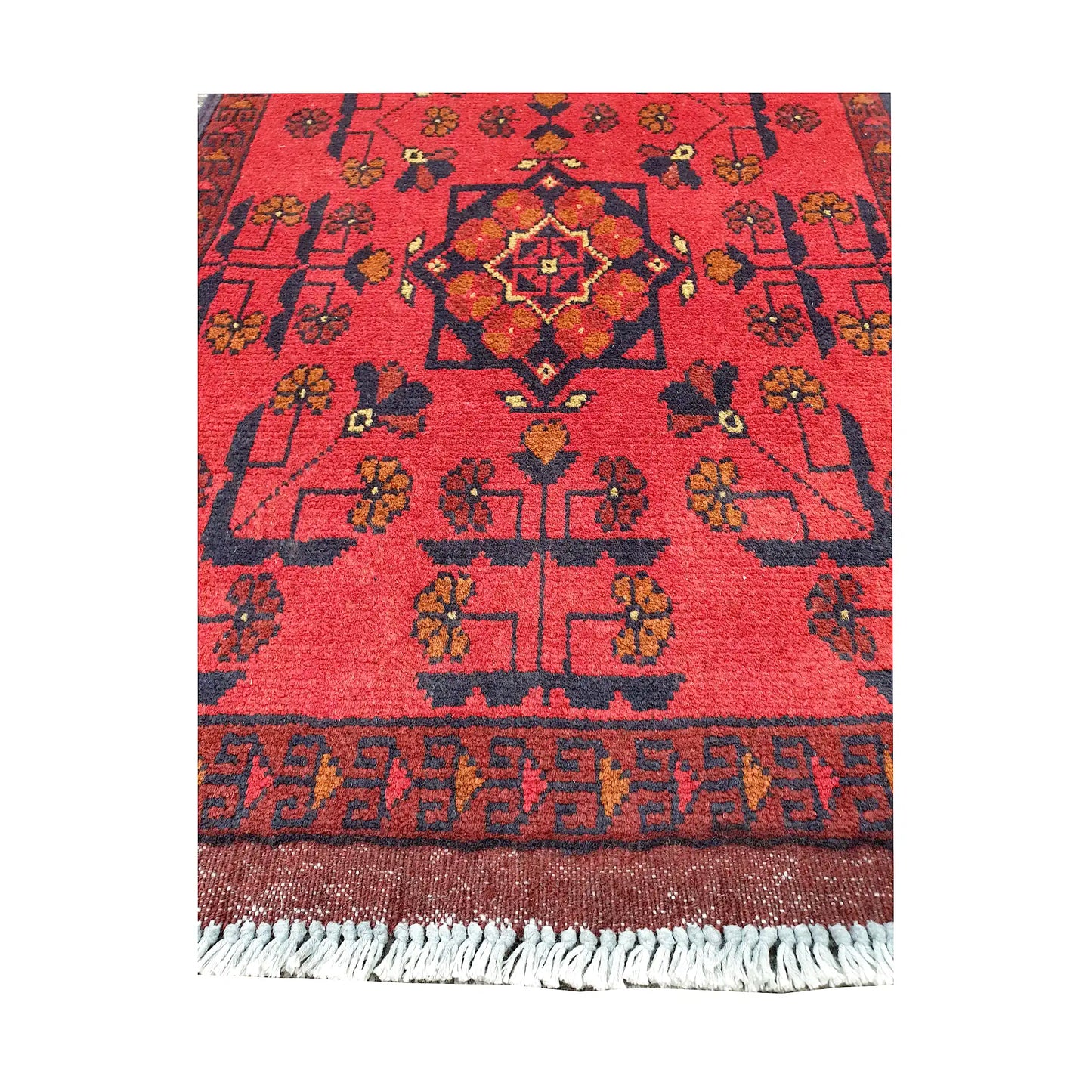 Central medallion and field detail of Afghan Khal Mohammadi hand-knotted rug showing red ground, dark motifs and patterned border