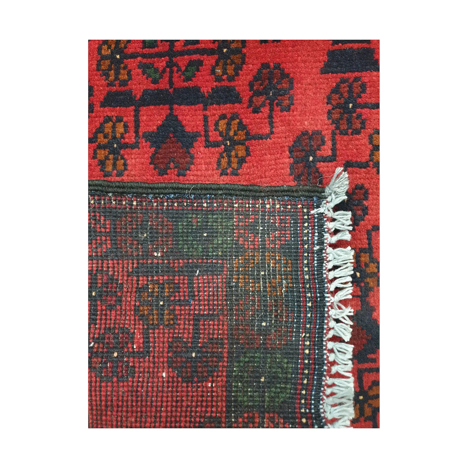 Folded corner reverse-weave detail of Afghan Khal Mohammadi hand-knotted wool rug showing back structure, border pattern, fringe and weave