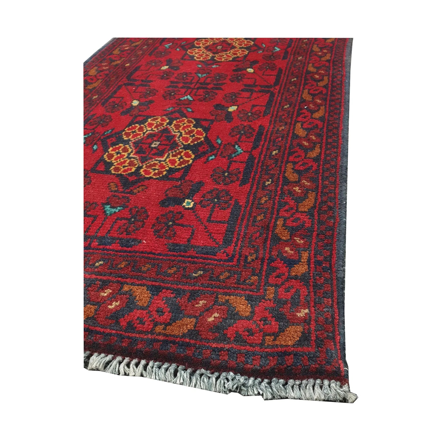 Angled corner and fringe view of Afghan Khal Mohammadi wool rug showing deep red field, dark border detail and light fringe