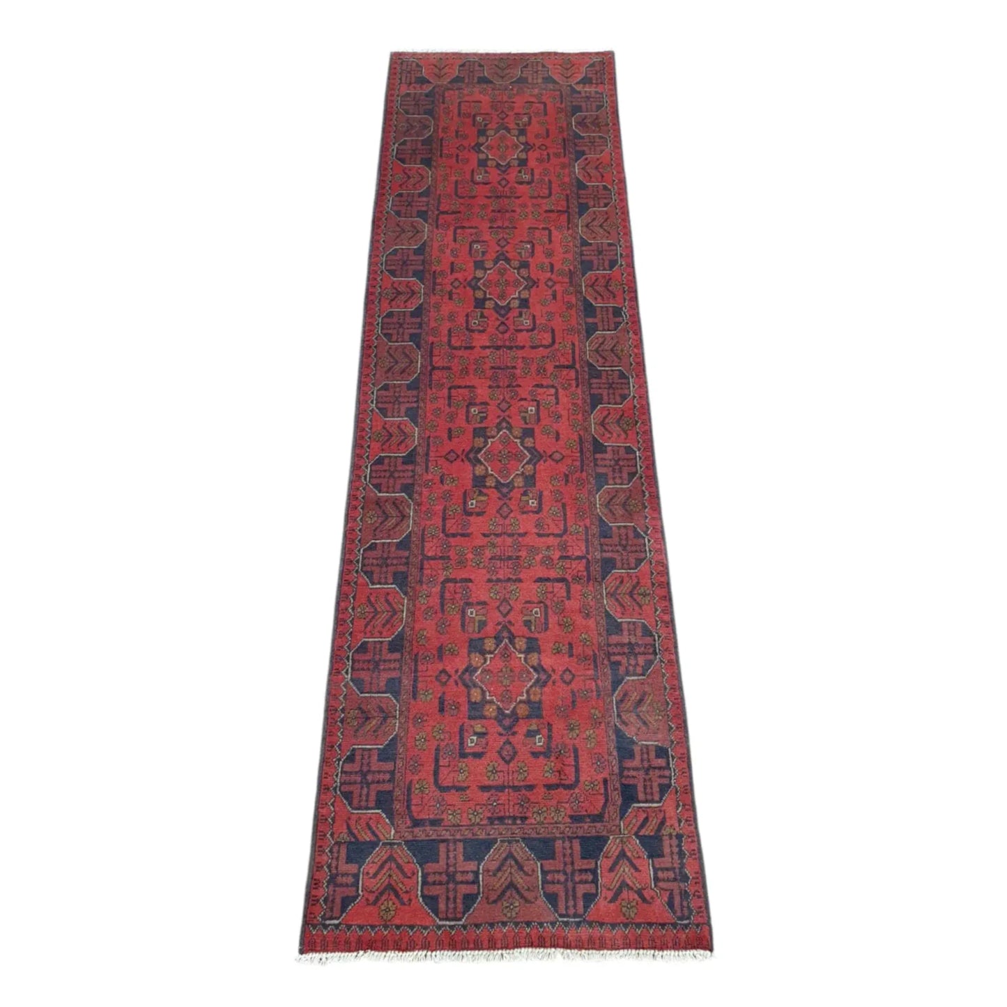 Full view of Afghan Khal Mohammadi hand-knotted wool runner rug with rich red field, repeating geometric medallions and deep navy border, 287 x 84 cm