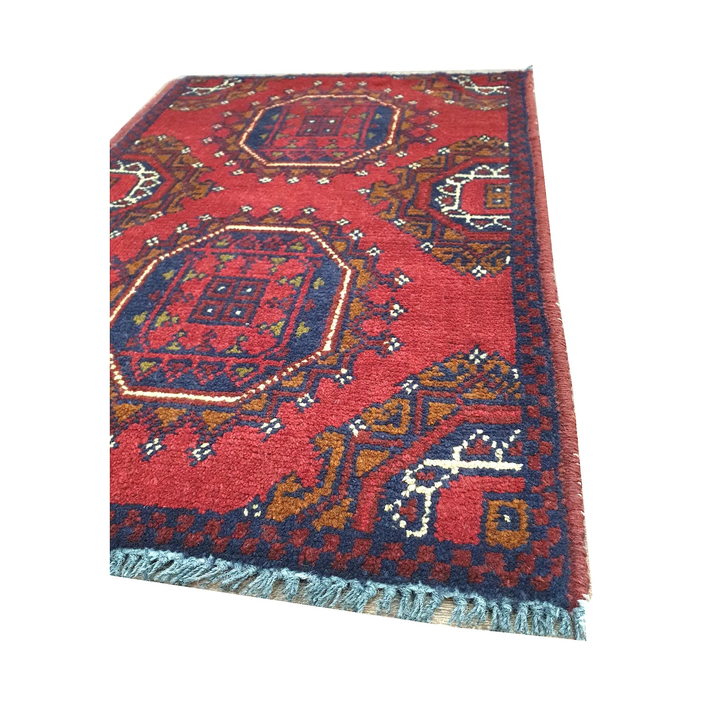 Fringe and border detail of Afghan Khal Mohammadi wool rug showing red pile, navy outlines and tribal motifs