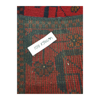 Reverse weave detail of Afghan Khal Mohammadi rug showing the handmade structure and size label