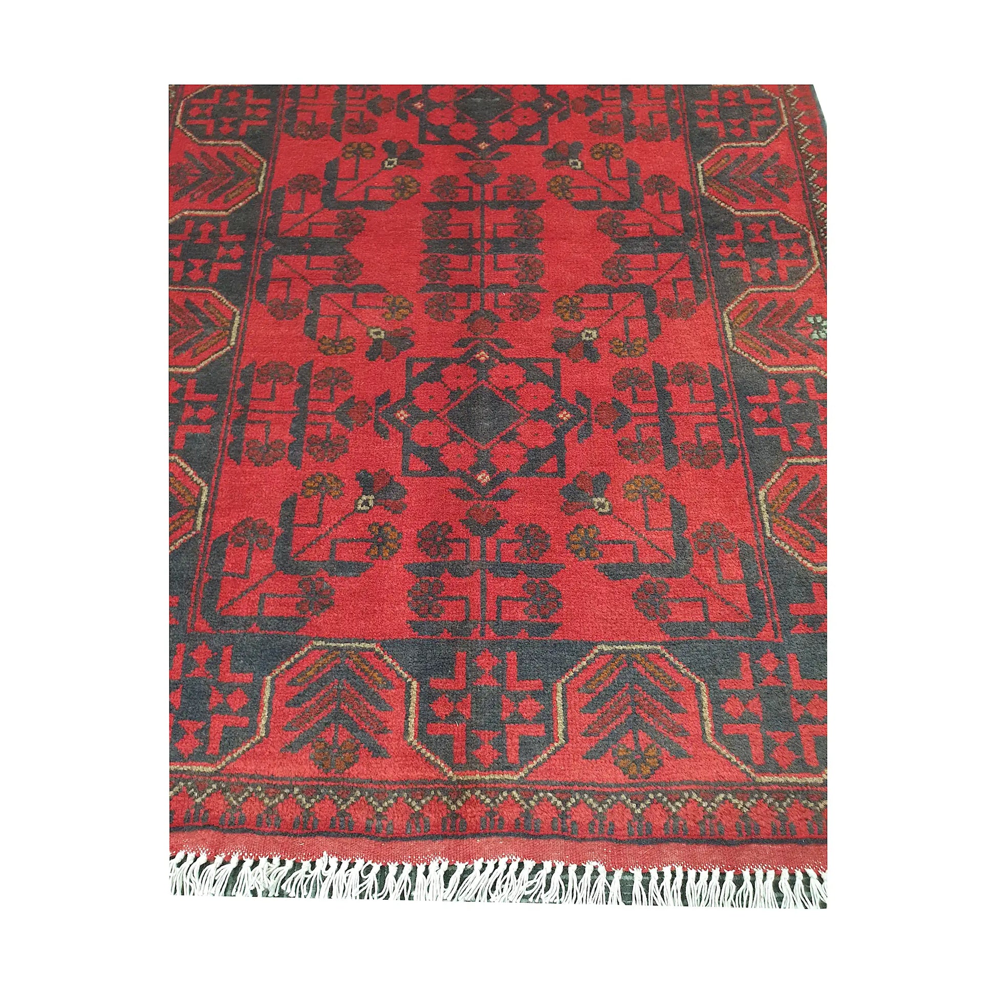 End fringe detail of Afghan Khal Mohammadi rug with deep red field, dark tribal motifs and geometric border