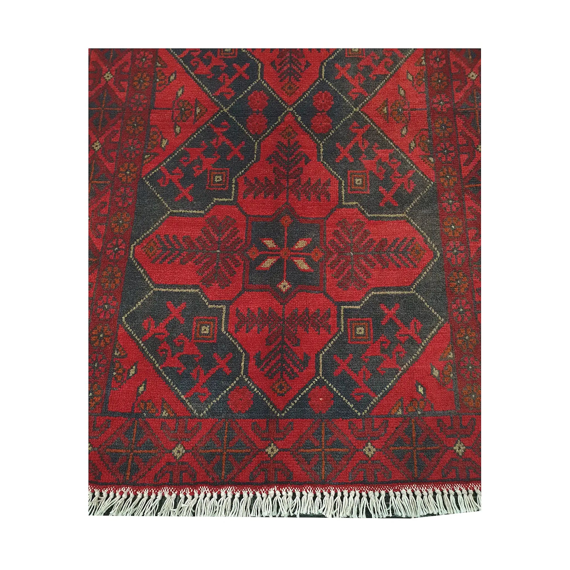 Central medallion and fringe detail of Afghan Khal Mohammadi rug with deep red field and charcoal tribal motifs