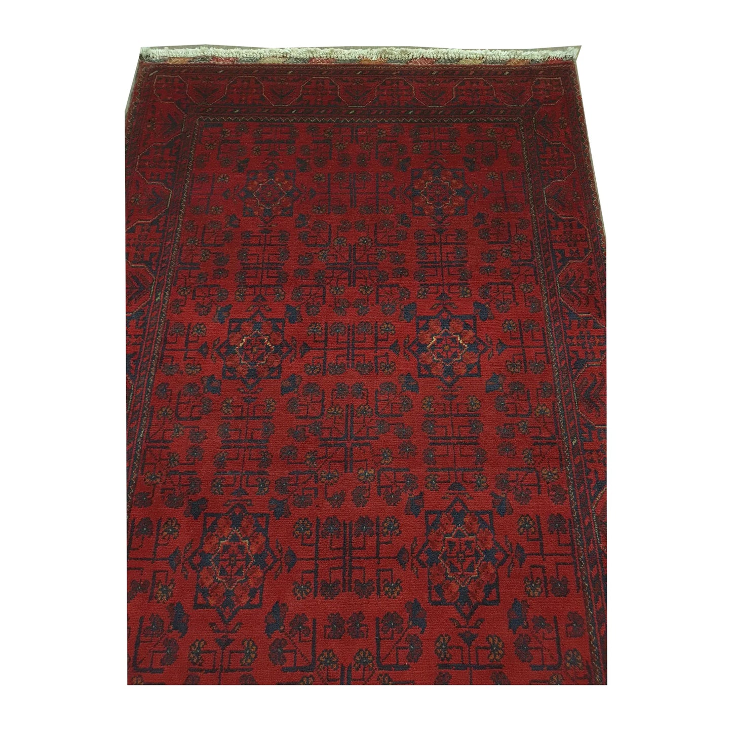 Close-up of Afghan Khal Mohammadi rug showing the red field, repeating floral medallions, stylised branching motifs, end border and fringe