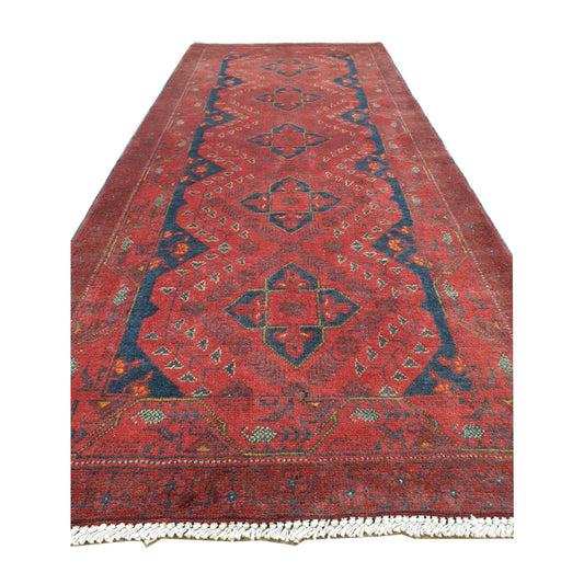 Border and fringe detail of Afghan Khal Mohammadi wool runner rug showing red and dark blue geometric motifs, 202 x 82 cm