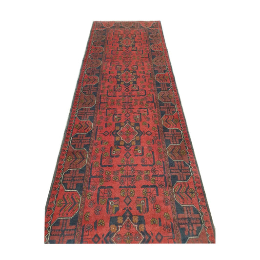Length view of Afghan Khal Mohammadi hand-knotted wool runner rug showing repeating medallions and dark geometric border, 287 x 84 cm