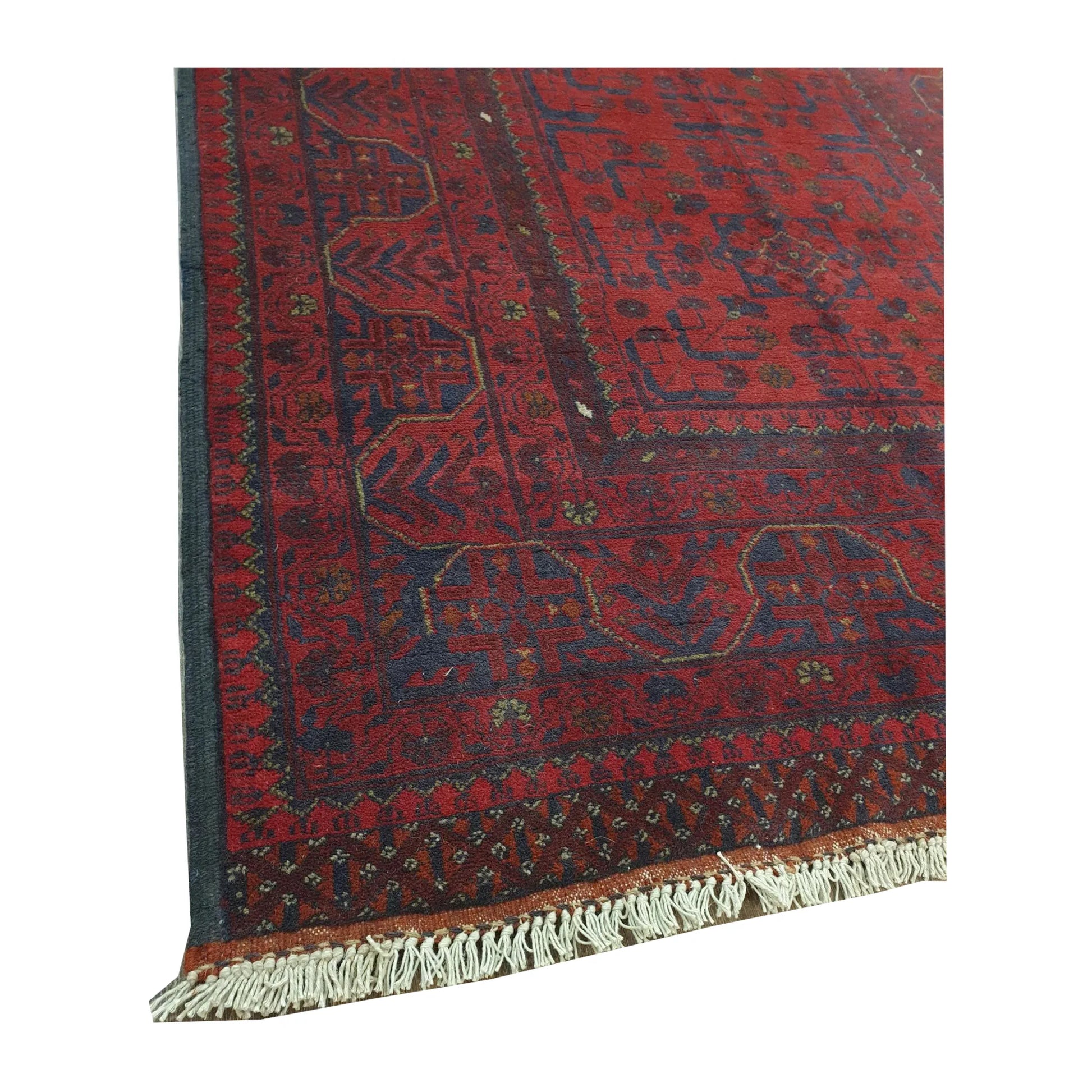End-border and fringe detail of Afghan Khal Mohammadi wool rug showing deep red motifs, dark border and wool pile texture, 151 x 104 cm