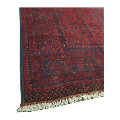 End-border and fringe detail of Afghan Khal Mohammadi wool rug showing deep red motifs, dark border and wool pile texture, 151 x 104 cm