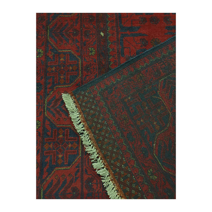 Reverse-weave corner detail of Afghan Khal Mohammadi hand-knotted wool rug showing the folded edge, fringe and handmade structure, 151 x 104 cm