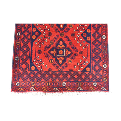 Fringe-end detail of Khal Mohammadi runner showing a diamond medallion, patterned borders and white fringe