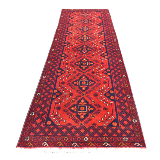 Full view of Afghan Khal Mohammadi hand-knotted wool runner with deep red field, diamond medallions and dark navy borders, 283 x 82 cm