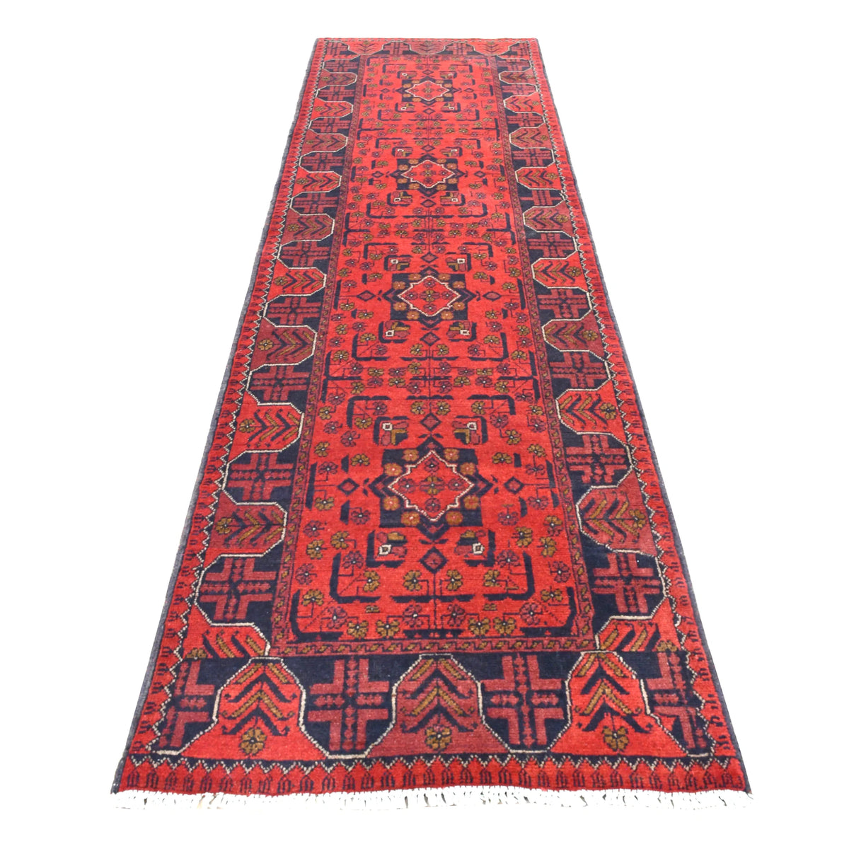 Full view of Afghan Khal Mohammadi hand-knotted wool runner with deep red field, stepped medallions and dark navy borders, 287 x 84 cm
