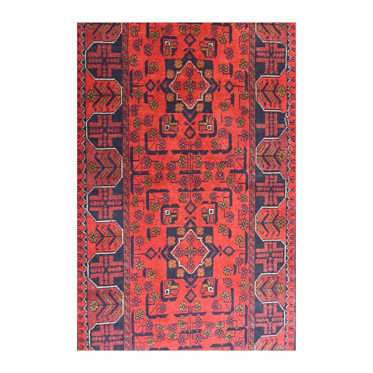 Field detail of Afghan Khal Mohammadi runner showing repeating red and navy medallions with small angular motifs