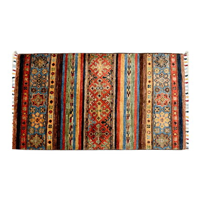 Full striped field detail of Afghan Khurjeen hand-knotted wool rug showing multicolour bands and geometric pattern layout