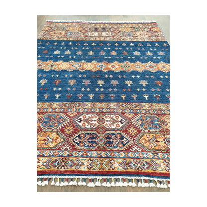 Field and border detail of Afghan Khurjeen hand-knotted rug with patterned bands