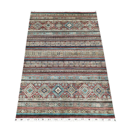Angled full view of Afghan Khurjeen wool rug showing multi-colour striped pattern