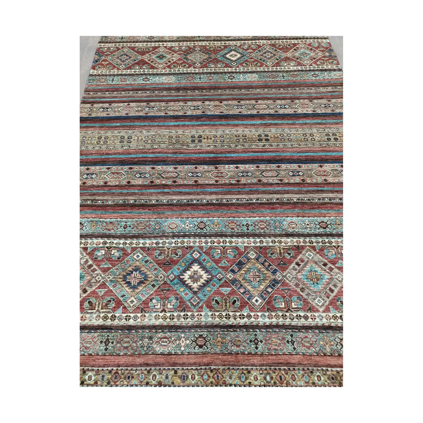 Striped field detail of Afghan Khurjeen hand-knotted rug with multi-colour pattern