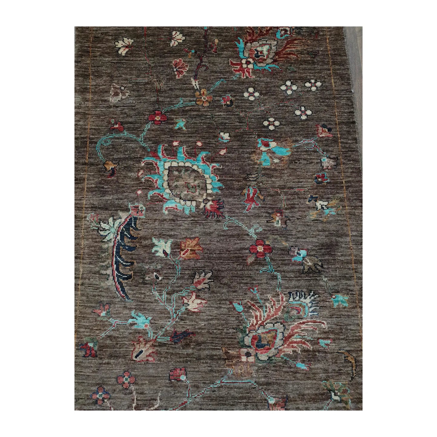 Botanical motif detail on Afghan Khurjeen hand-knotted wool runner rug