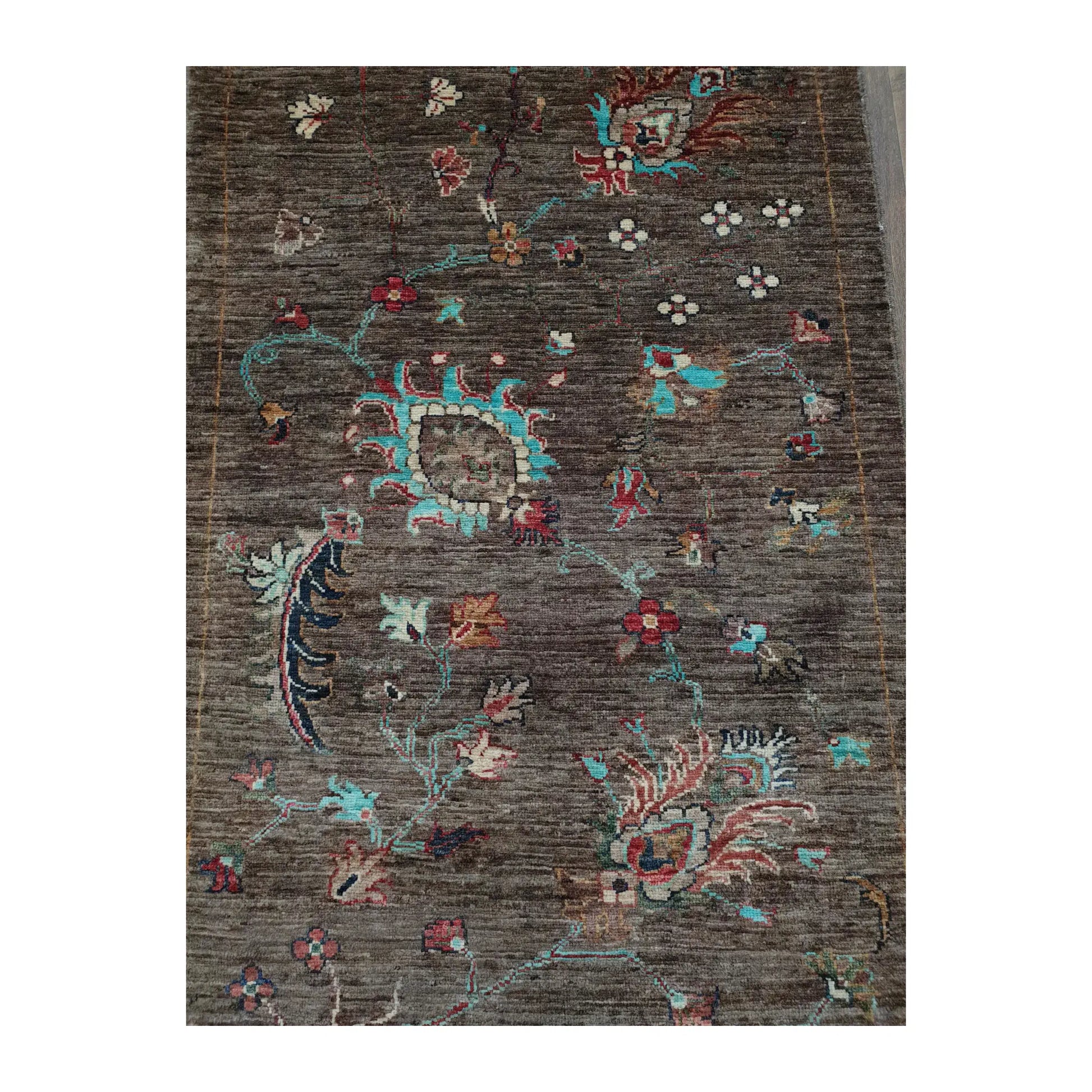 Botanical motif detail on Afghan Khurjeen hand-knotted wool runner rug