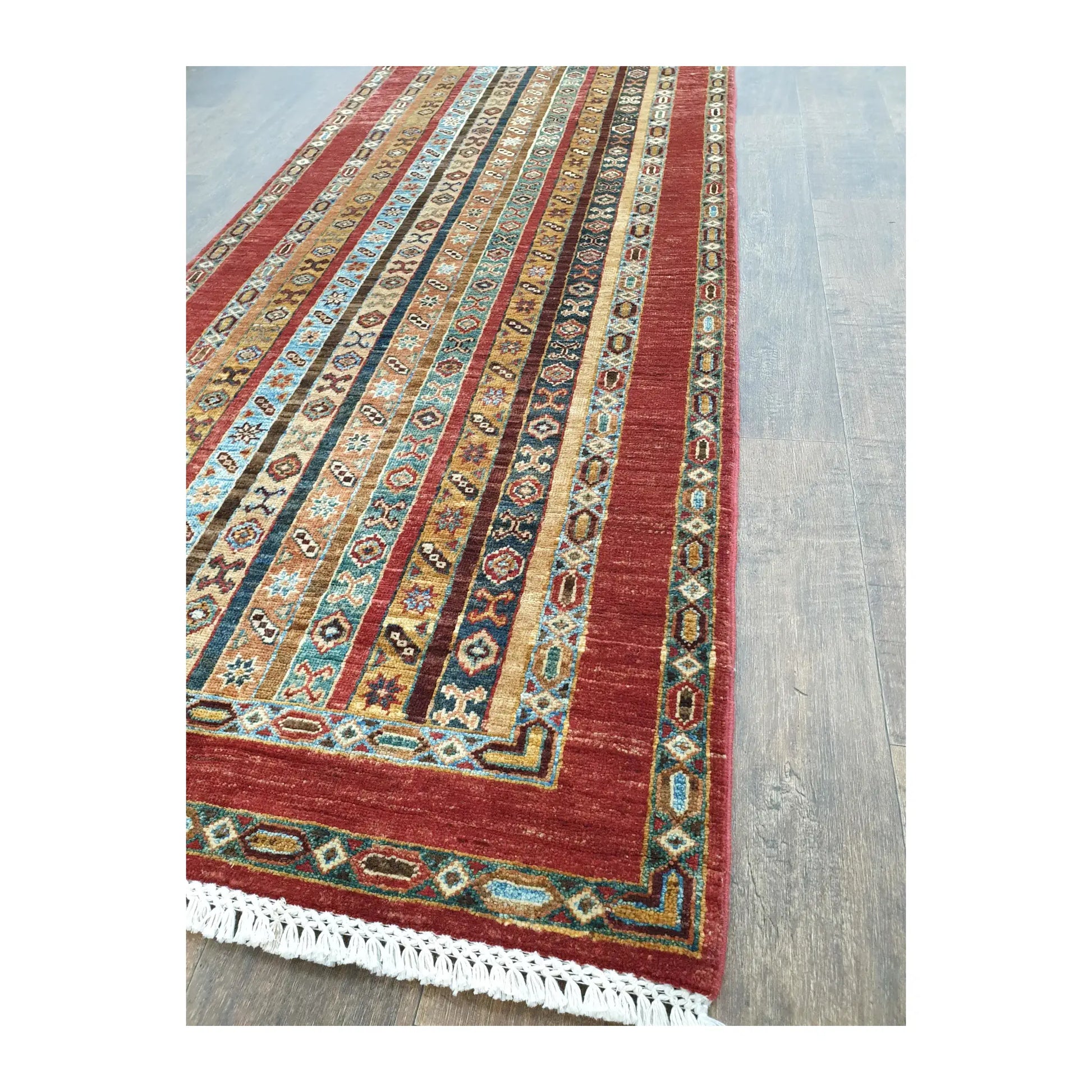 Fringe and border detail of Afghan Khurjeen wool runner rug with multi-colour motifs
