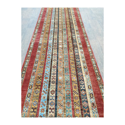 Striped field detail of Afghan Khurjeen hand-knotted runner rug with geometric motifs