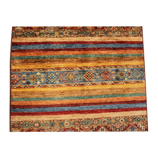 Close-up of Afghan Khurjeen rug showing the horizontal striped bands and central patterned section