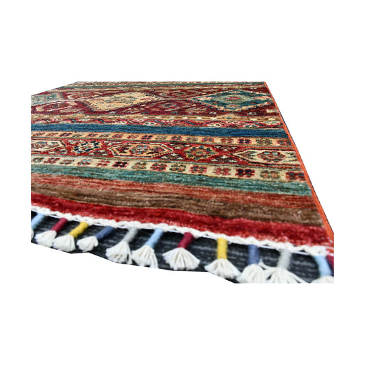 Fringe and edge detail of Afghan Khurjeen runner rug showing wool texture, tassels and multicolour striped pattern