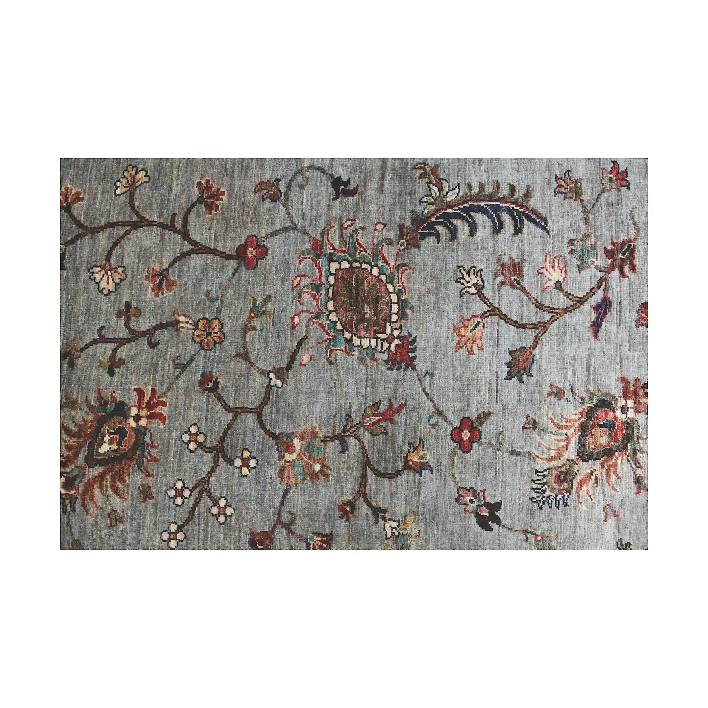 Pattern detail of Afghan Khurjeen runner rug showing grey field, floral vines and decorative motif work