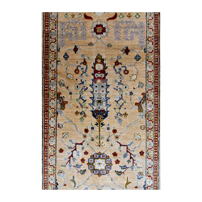 Field detail of Khurjeen wool runner showing spaced floral medallions, small blossoms and curling muted blue vines