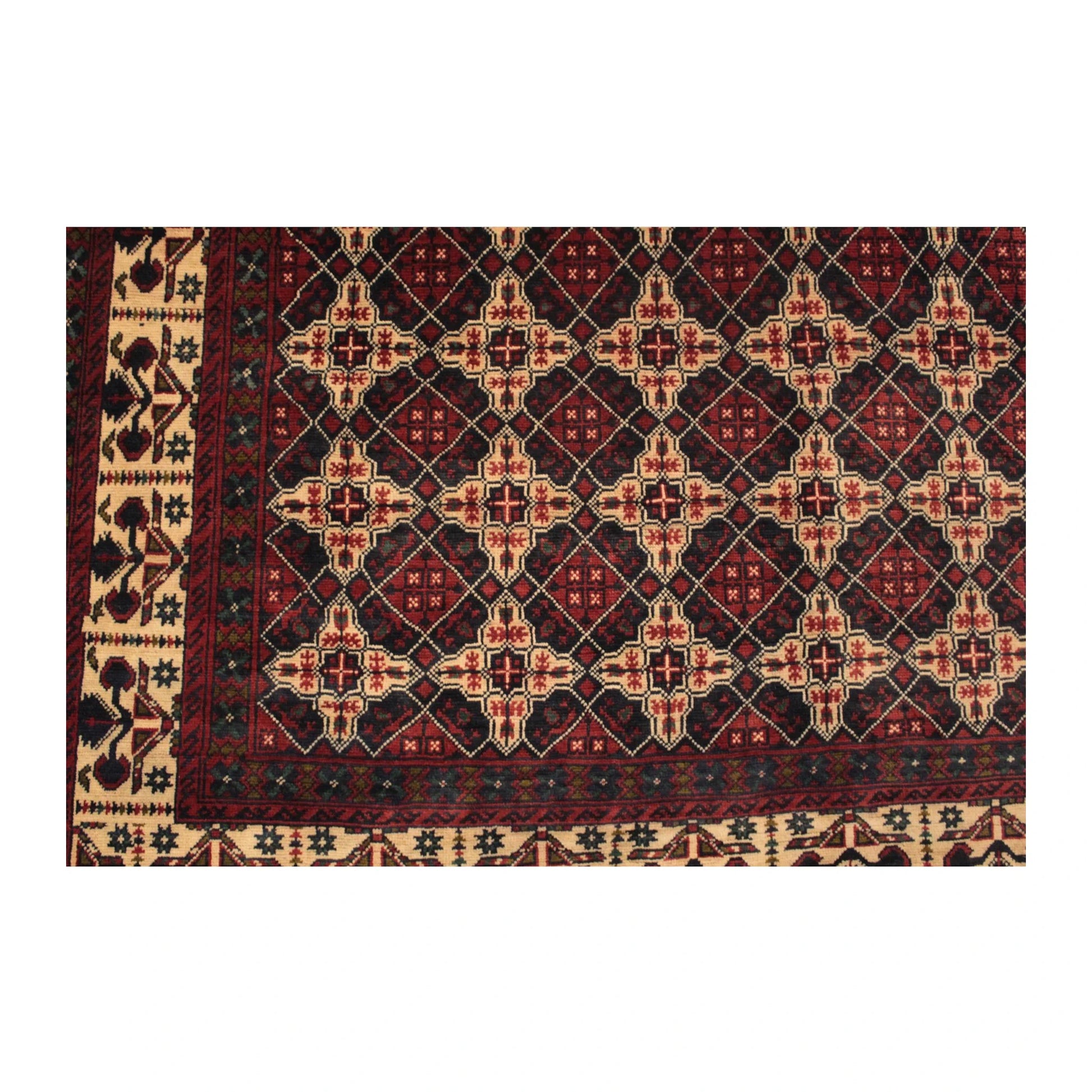 Close-up of Afghan Kunduz rug showing the repeating floral-gul field and layered border