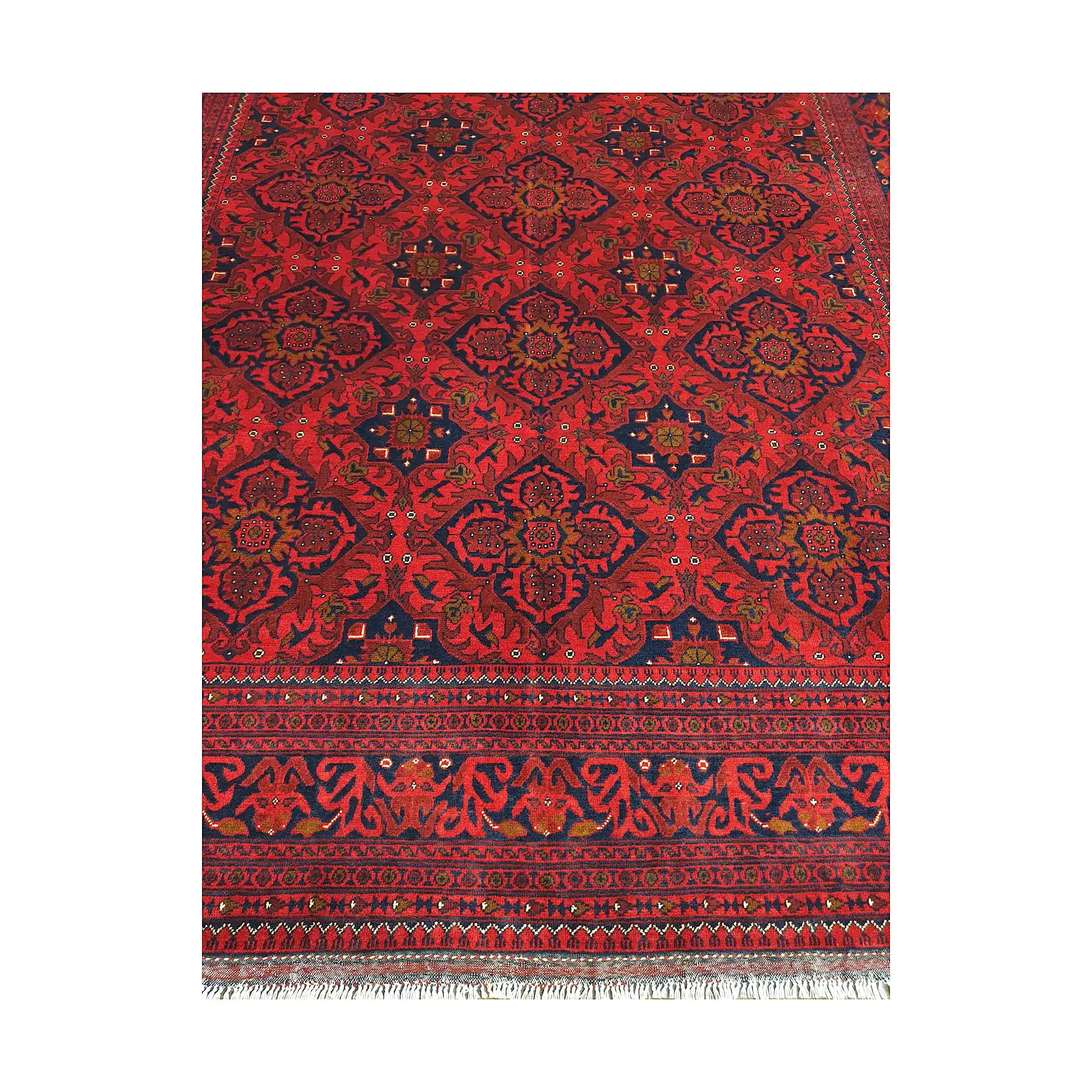 Floral lattice and border detail of Afghan Kunduz rug showing deep red field, blue accents and traditional pattern