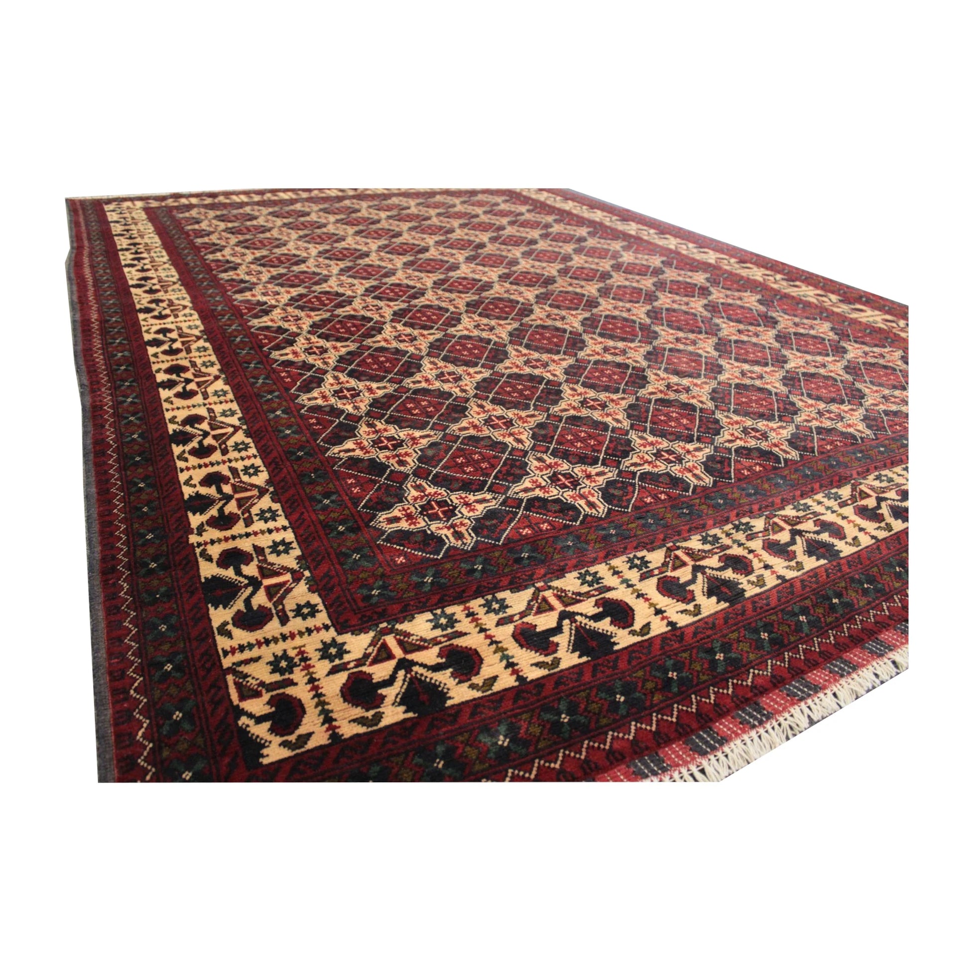 Angled full view of Afghan Kunduz wool rug showing the repeating floral-gul lattice and layered borders