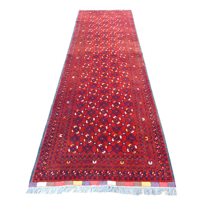 Full view of Afghan Kunduz hand-knotted wool runner with deep red field, diamond lattice and layered dark borders, 285 x 85 cm