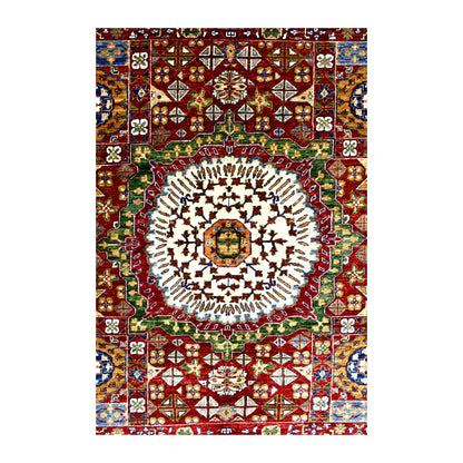 Central cream medallion encircled in green on the red Mamluk rug, with blue and gold details.