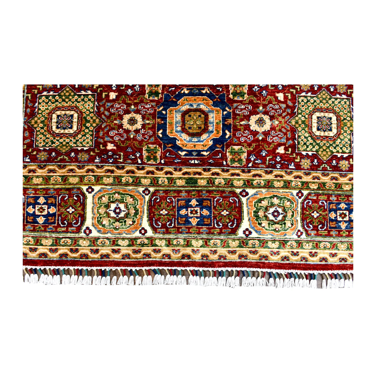 Fringed end of the Mamluk rug with colourful framed motifs and layered geometric borders.