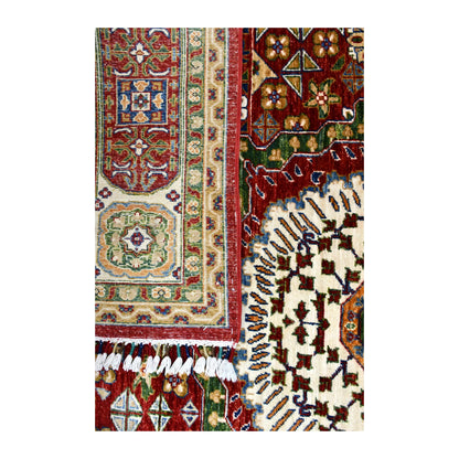 Close-up of the folded rug showing the patterned reverse beside the cream medallion and white fringe.