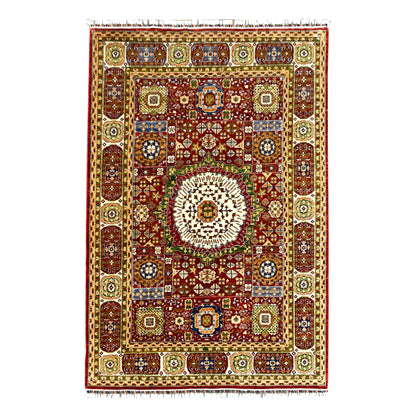 Full view of red Afghan Mamluk rug, 283 x 206 cm, with cream medallion and wide patterned borders.