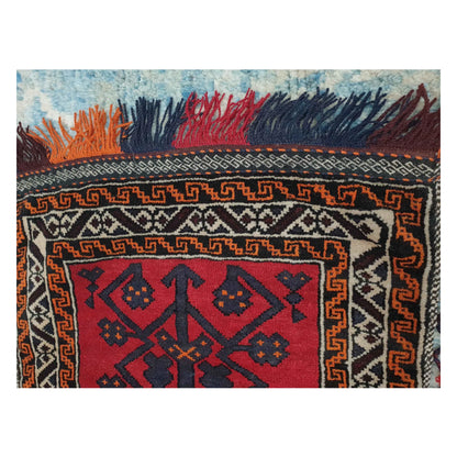 Border detail of Afghan Pushti wool pillow cover with red and black geometric pattern