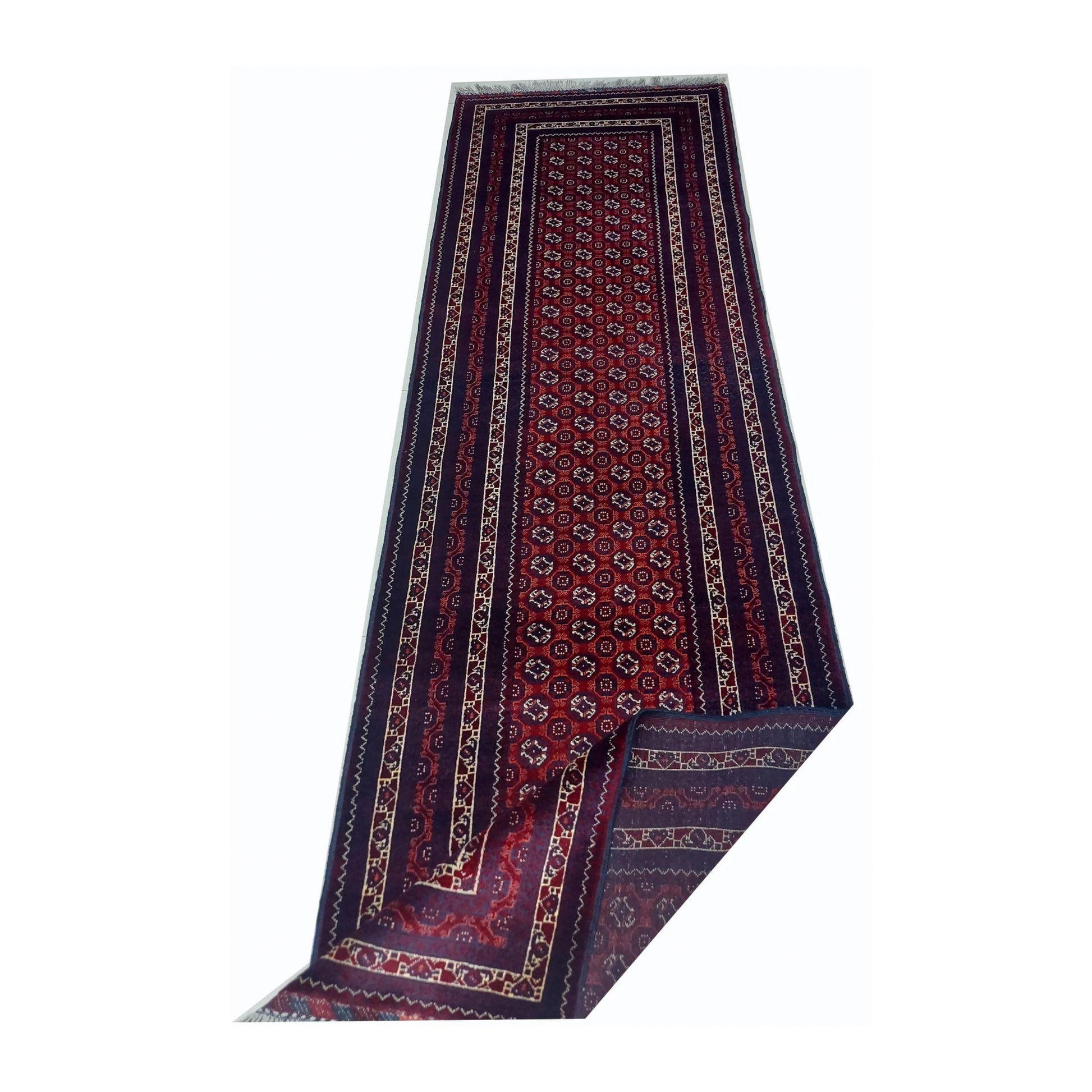 Folded-corner detail of Afghan Roshnai wool runner rug showing front and reverse weave, 282 x 84 cm