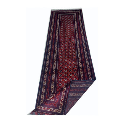 Folded-corner detail of Afghan Roshnai wool runner rug showing front and reverse weave, 282 x 84 cm