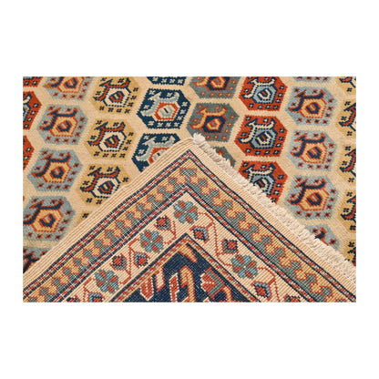 Reverse corner detail of Afghan Shirvan wool rug showing folded underside and patterned border, 243 x 165 cm